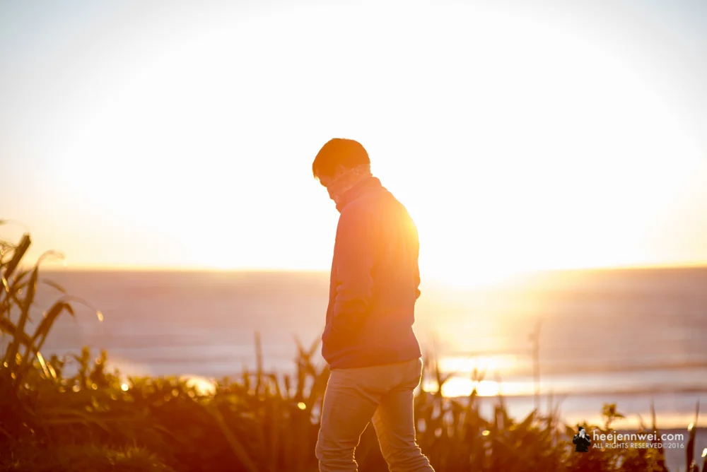 Sunset at the Great Coast Road, lookout point after Slow Bay. Don't be afraid to shoot right at the sun, sometimes it grants you beautiful backlight. 