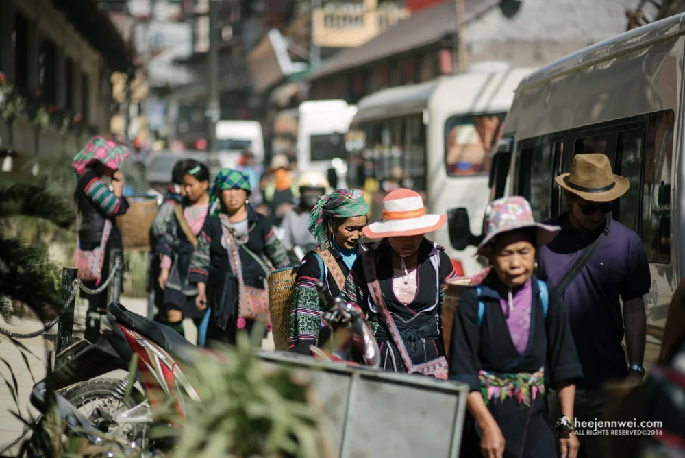 Crossing the hustle bustle Sapa tour, to the entrance to our treks.