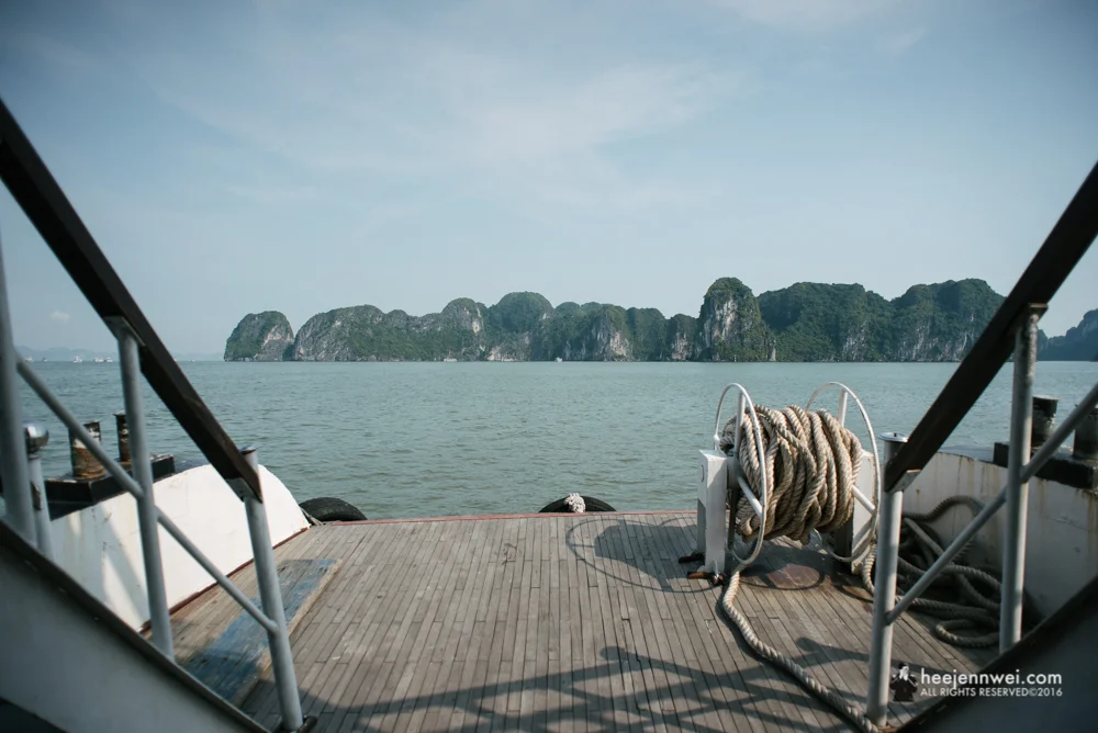 On the deck towards Halong Bay rock formation.