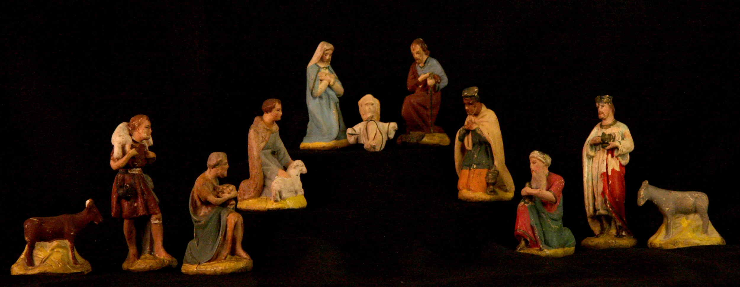 This Nativity set, which shows the shepherds and wise men in the act of adoration, was probably made in southern Germany around 1920. Figures like these were a cottage industry, made in small quantities in homes and sold by peddlers who traveled around Germany and neighboring countries. Chalkware sets were common in both middle class and lower middle class homes. Collection of Glencairn Museum.