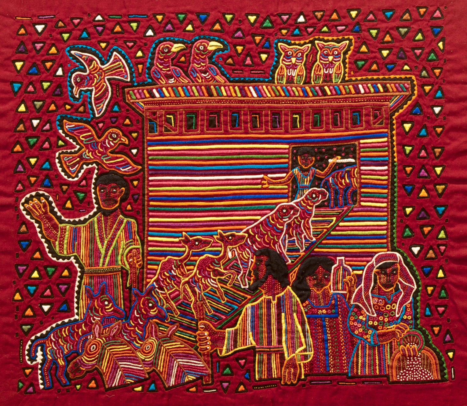 Figure 3: Noah’s Ark. One of the most-read of all Bible stories is that of Noah’s ark. Here Noah stands in the foreground, guiding the animals as they walk up the walkway into the ark, two by two.