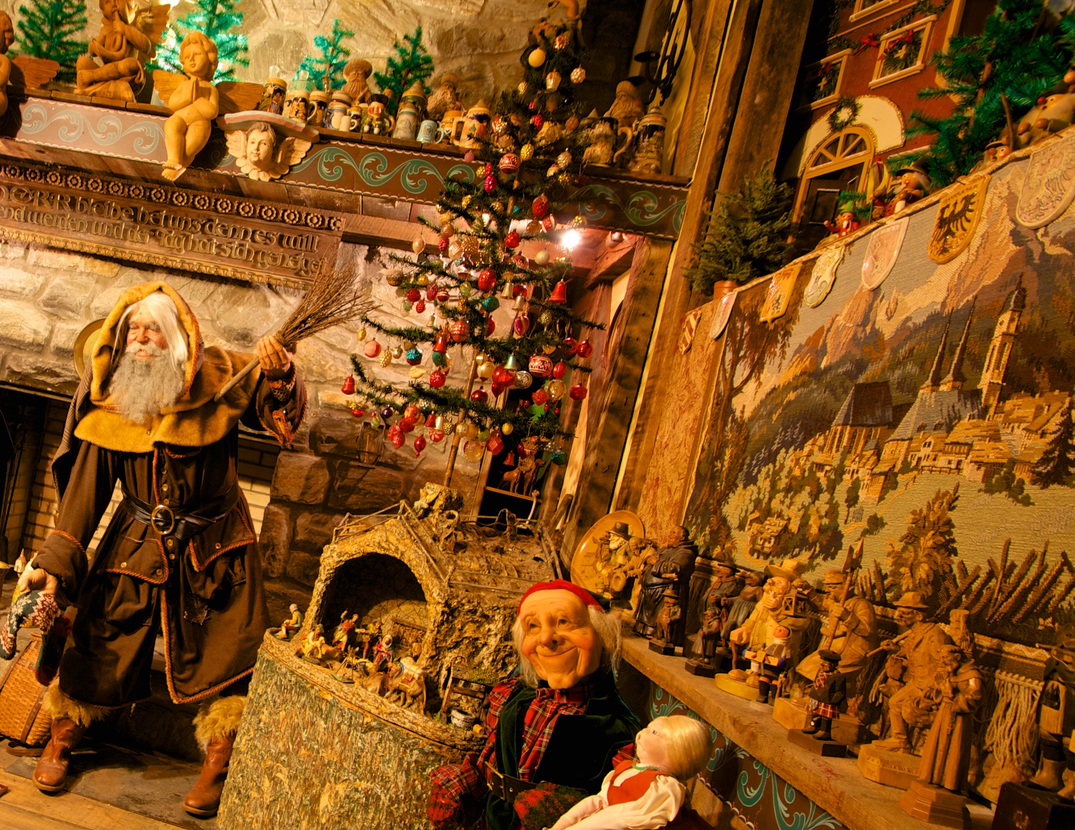 Figure 2: This exhibit about Christmas traditions in Germany is part of a Christmas around the World room at the National Christmas Center and Museum. The life-sized figure of the Weihnachtsmann (“Christmas Man”) bears more than a passing resemblance to Jim Morrison, founder and curator of the museum. Jim and several others were used as models for some of the figures.
