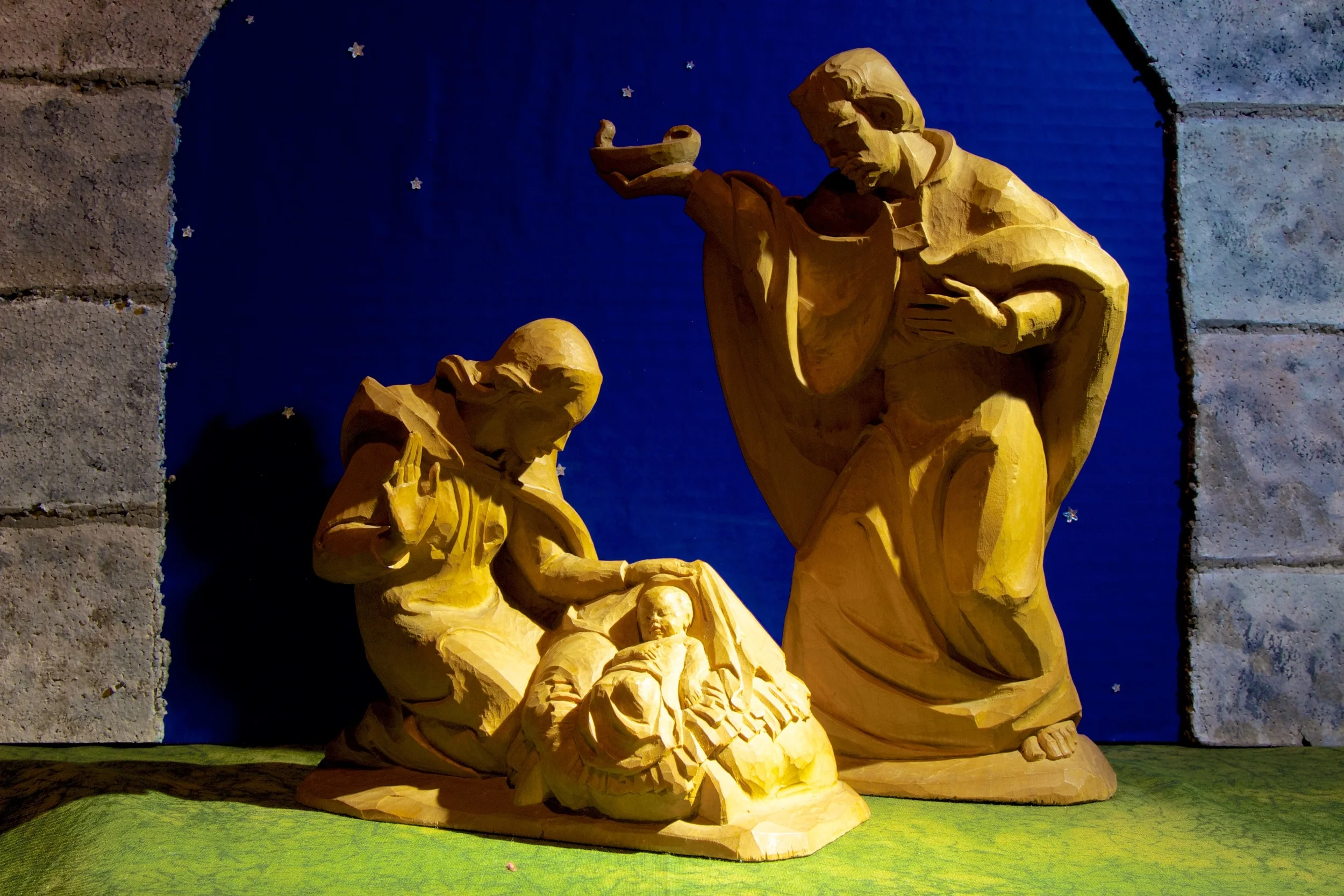 Figure 2: This Holy Family was carved by Sepp Kals, an academically trained sculptor from Kirchberg in Tirol, Austria. Kals also designed and carved sculptures for several church altars. These Nativity figures were given as Christmas presents by Arthur Compton and his wife to each other. The base of Joseph is inscribed, “to Arthur Compton from Betty Xmas 1953,” and the base of Mary is inscribed, “to Betty Compton from Arthur Xmas 1953.” Arthur was the winner of the Nobel Prize for Physics in 1927. He appeared on the cover of Time magazine, and was a key figure in the Manhattan Project.