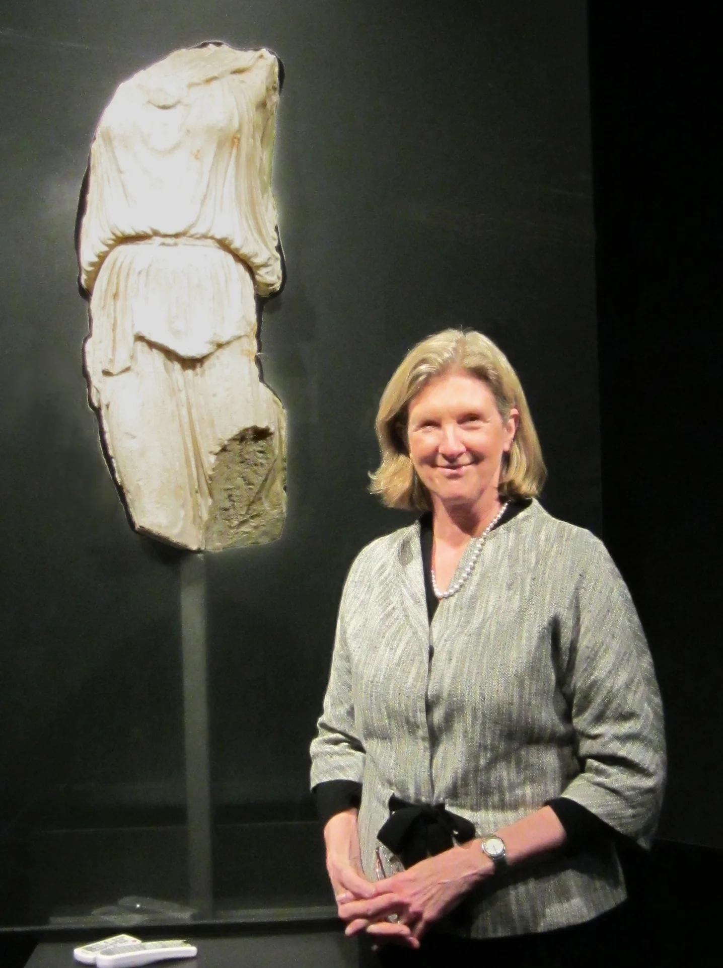 Figure 1: The author, Dr. Irene Bald Romano, with the Sorgente Athena Nike in the exhibition space of the Fondazione Sorgente Group. Photograph by Kenneth Lapatin.