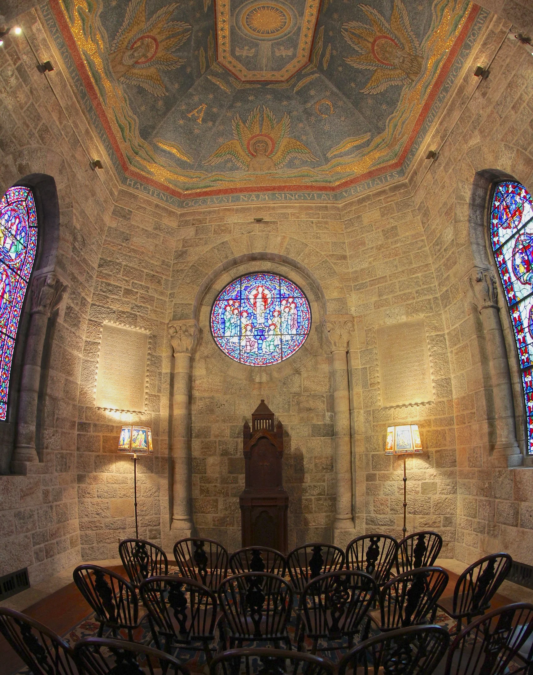 The Pitcairn family chapel features a magnificent mosaic ceiling, with a brilliant gold sun and four doves in the center panel.
