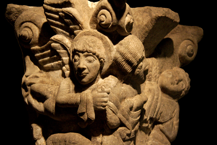Cain and Abel Capital: Angel Touching Cross to Abel's Shoulder