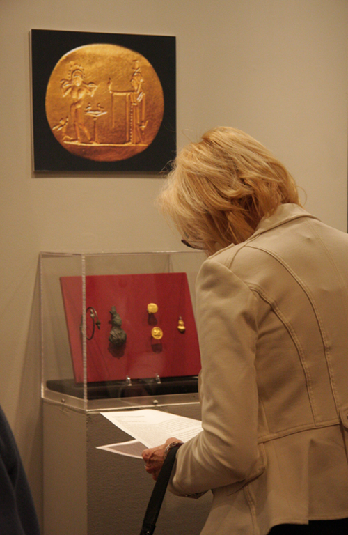 Exhibition Visitor Looking at Roman Jewelry