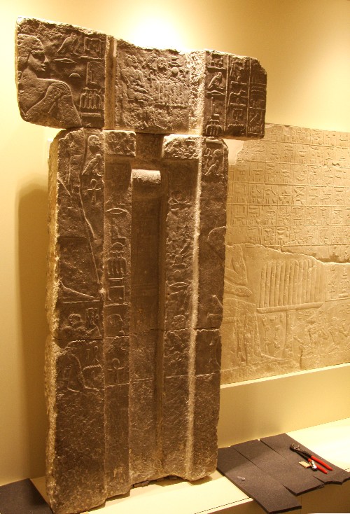 The spirit door of Tep-em-ankh, on loan from Glencairn Museum, in its place beside a relief with the tomb owner's "menu list" (right), which is on loan from the Louvre Museum.
