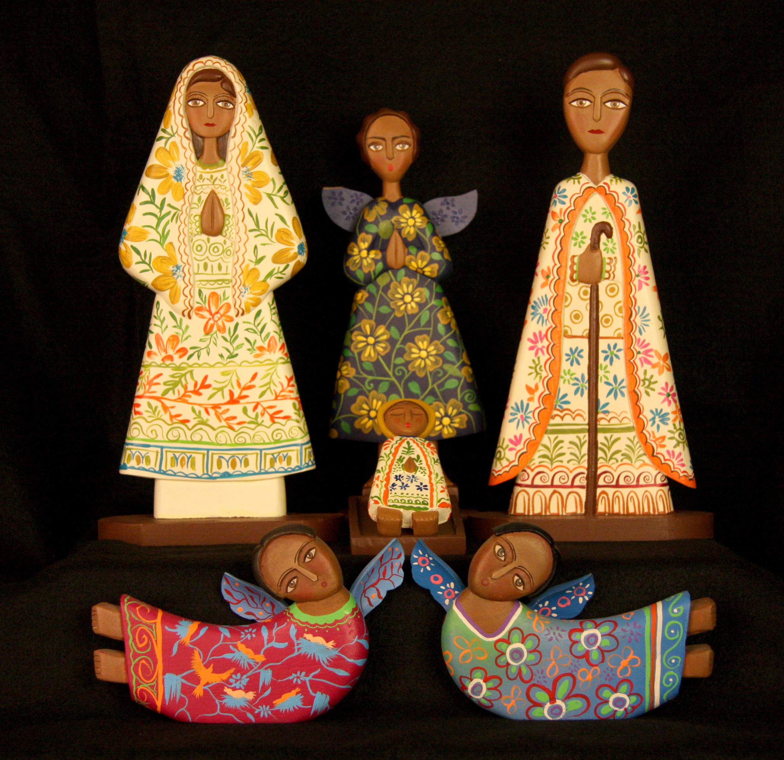  The Jimenez family of Masaya, Nicaragua, carves Nativity figures from cedar wood, which are then brightly painted by local artists. The father, mother and children are all involved in the process. In addition to the Holy Family, this Nativity includ