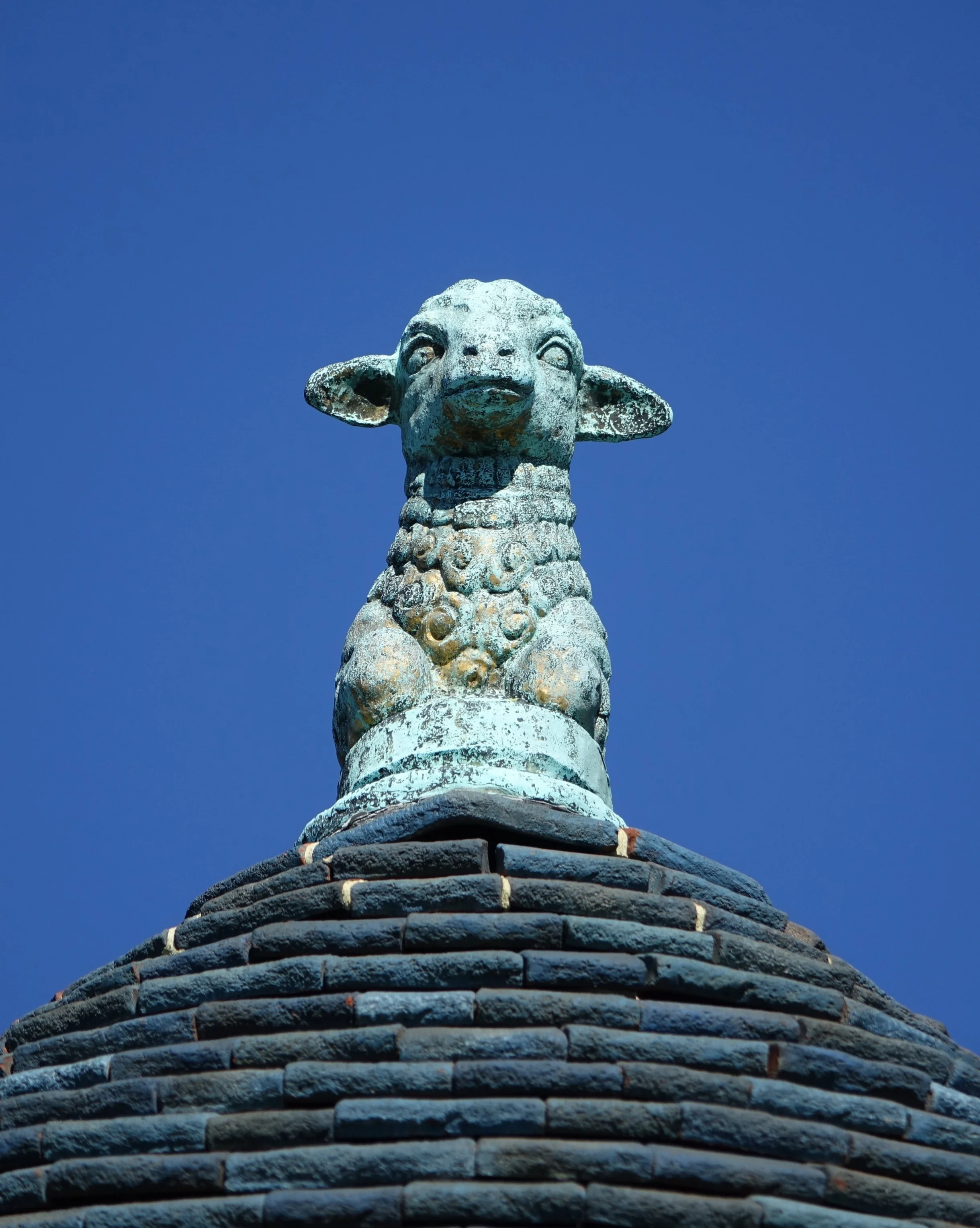 Figure 3: This metalwork lamb sculpture is perched on top of the roof of the upstairs living room.