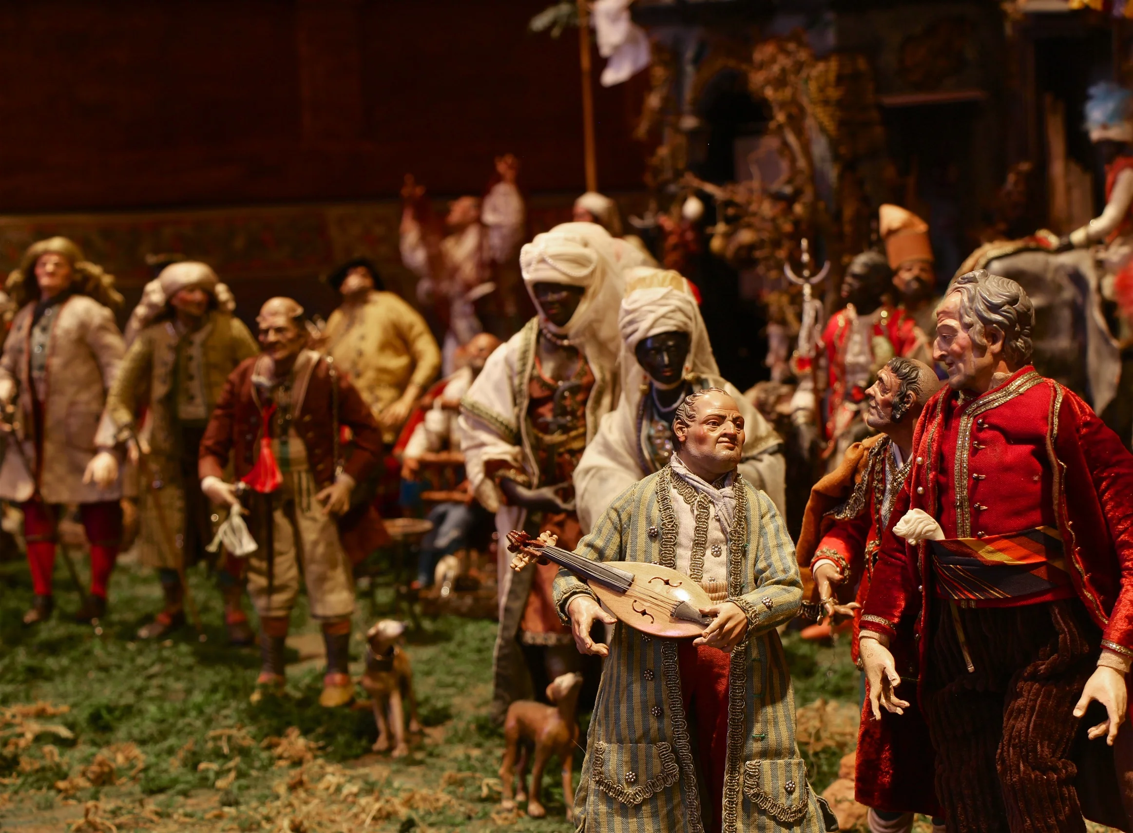 Figure 2: Life at the inn goes on as usual, but the attention of some of the customers has been drawn in the direction of the Nativity. Some of them are walking toward the Roman ruins.