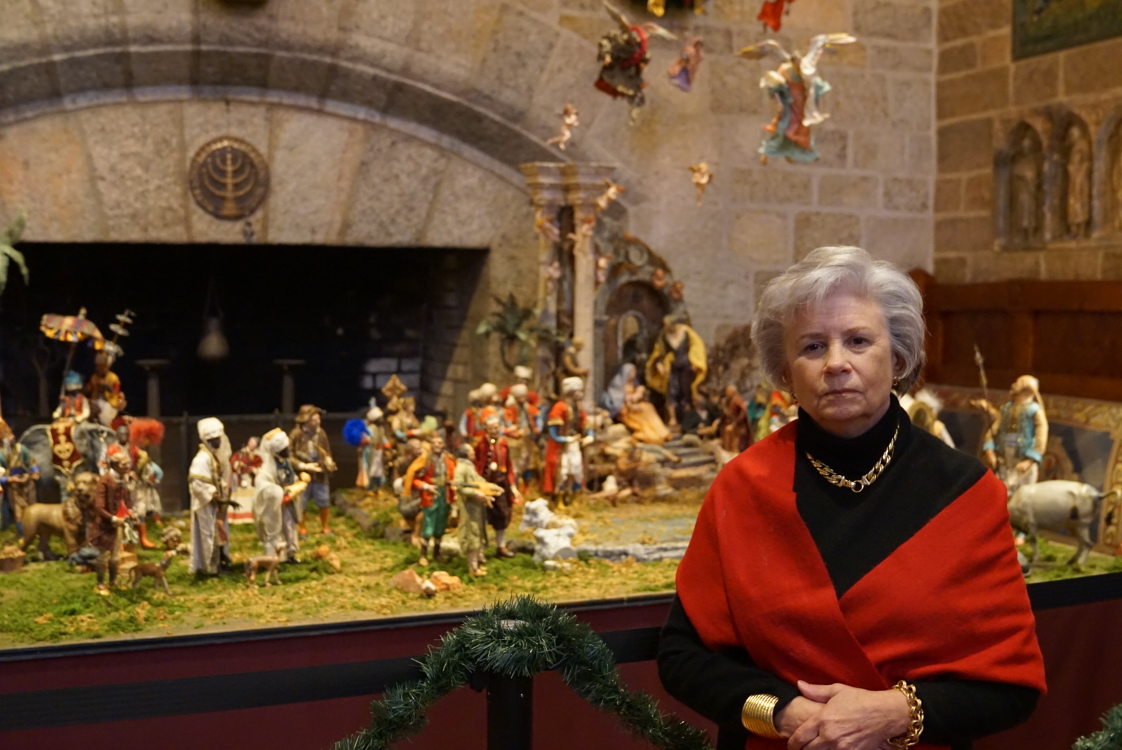 Figure 6: Marcia Evans at the opening of Glencairn’s World Nativities exhibition. Marcia and her sister Suzanne Hoyle-Rhodes donated the Presepio to the Fleisher Art Memorial in memory of their sister Elizabeth Anne Evans. Elizabeth collected the figures and structures over a period of more than thirty years during her annual trips to Naples, Italy.