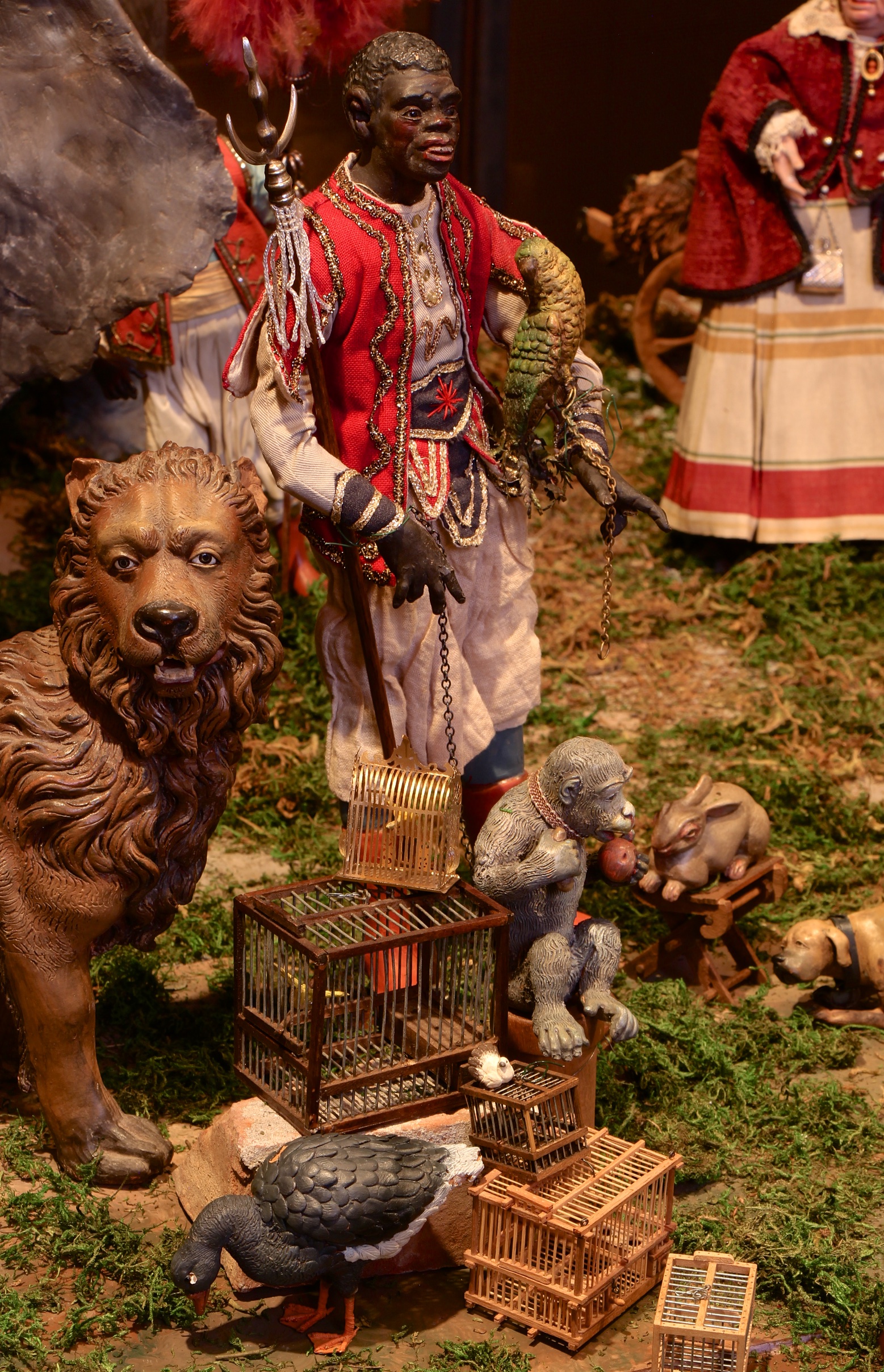 Figure 14: The vendors seem more concerned with their sales than with the excitement at the Roman ruins. An exotic animal vendor with a parrot on his arm restrains a monkey with a leash.