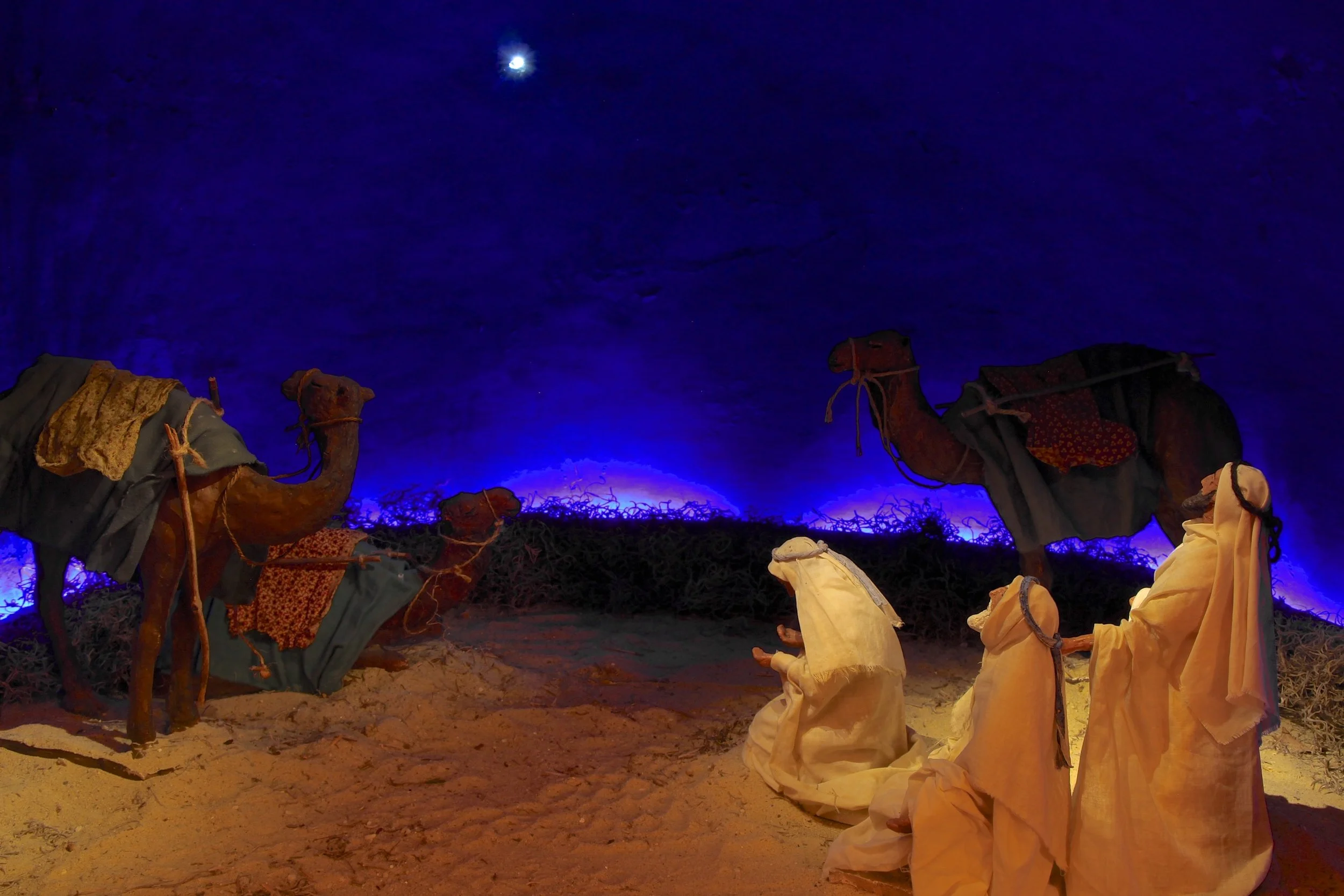 Figure 1: One of three Nativity scenes designed in the 1920s by Bryn Athyn artist Winfred S. Hyatt shows the Magi gazing at the Star of Bethlehem. The scenes were commissioned by Raymond and Mildred Pitcairn for use in their home at Cairnwood, where they were considered to be the most important element in the elaborate Christmas decorations in the parlor hall. A letter written by Raymond Pitcairn to Hyatt during the beginning of the work (January 15, 1924) indicates his desire that historical accuracy be taken into account as well as artistic composition. When the Pitcairn family moved to Glencairn in 1939, the three-part Nativity scene moved with them. Collection of Glencairn Museum.
