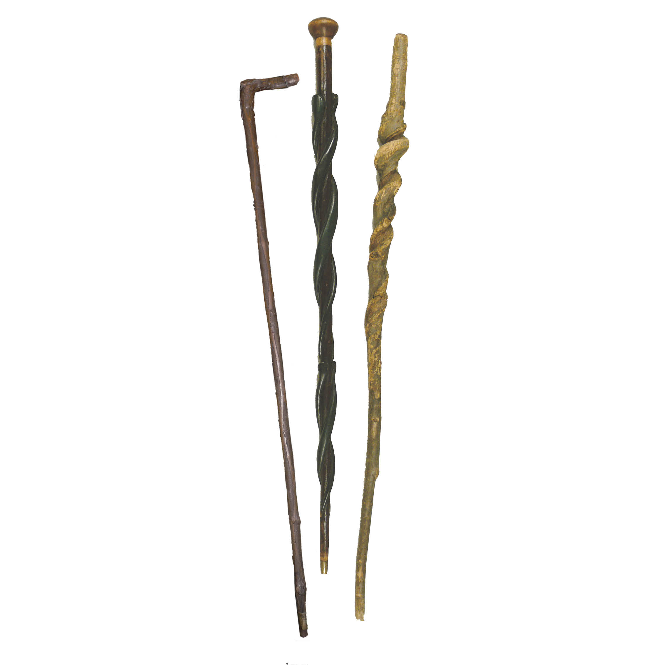 Figure 4: Left : A powwower’s cane, also called a “throw-stick,” used as a wand for healing and divination, Montgomery County, PA. Heilman Collection of Patrick J. Donmoyer. Middle : A cane wrapped with four carved serpents, used by a powwower from Hamburg, Berks County. Courtesy of the Mercer Museum, Doylestown, Pennsylvania. Right : A naturally formed spiral cane from vine, used as a powwow cane in Berks County. Courtesy of the Mercer Museum, Doylestown, Pennsylvania.