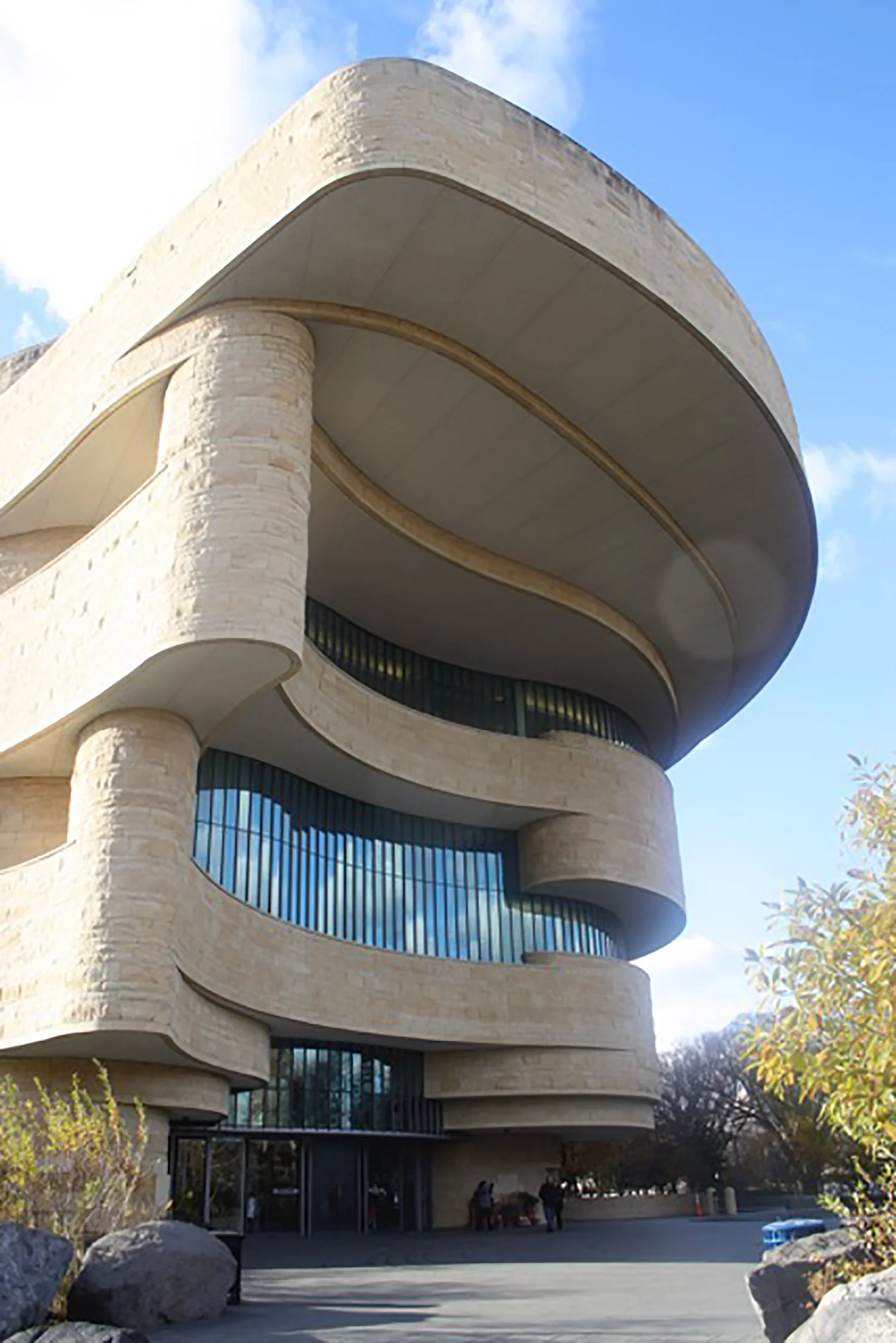 During the design phase of the building in the 1990s, the National Museum of the American Indian consulted with Native communities and individuals across the Western Hemisphere. According to the museum’s website, it was decided that “the building's design should make specific celestial references, such as an east-facing main entrance and a dome that opens to the sky. . . The building’s distinctive curvilinear form, evoking a wind-sculpted rock formation, grew out of this early work, forming the basis for the architecture.” Photo: Crispin Paine.