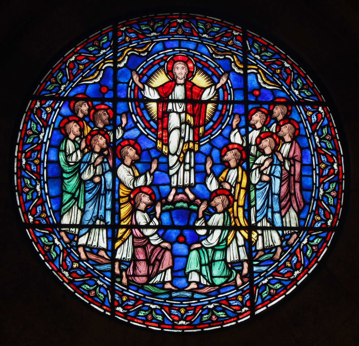 Figure 14: In a central position on the east wall, this roundel window, made in the Bryn Athyn glassworks, features Jesus Christ and the twelve apostles.