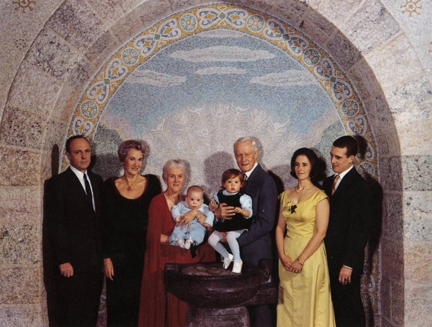 Figure 4: Raymond and Mildred Pitcairn pose behind the libation bowl in this four generation portrait.