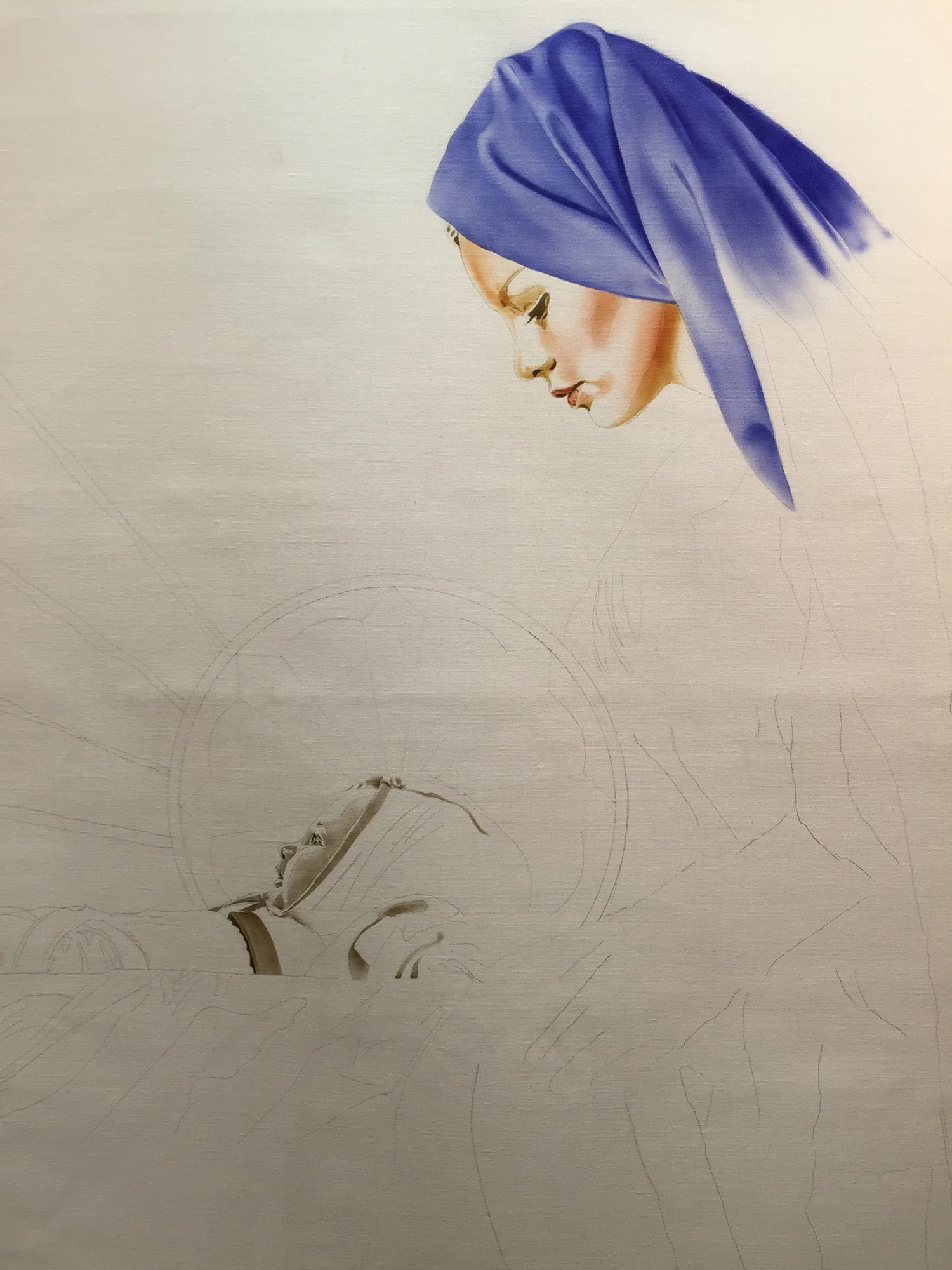 Figure 5: “This is the beginning of the underpainting of Mary and the baby, over the rough pencil drawing. The acrylic paint is applied with an airbrush, which I use for a couple of reasons. I basically learned to paint with it, and used it exclusively for more than 20 years. Because I am so comfortable with it, I use it to get the first stages of the painting done. The next step is using oil paint and transparent oil glazes on top of the underpainting. Glazes allow a richness and depth of color that is hard to achieve with opaque paints. Both the airbrush and the glazes are transparent and allow the white of the canvas to show through, adding an extra depth and luminosity.” (Edwin Herder)