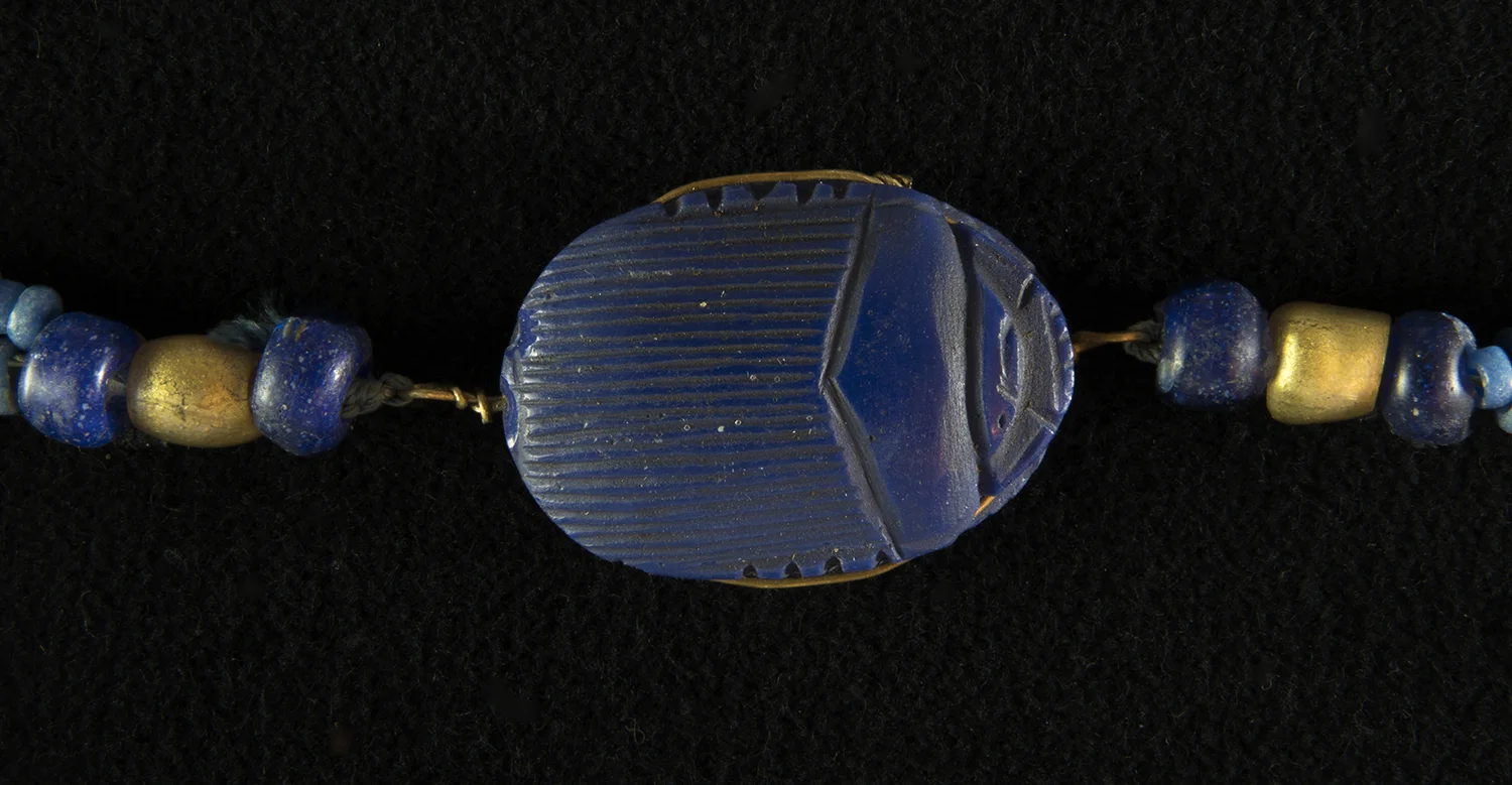 Figure 35: This somewhat stylized scarab amulet is made of lapis lazuli. Glencairn 15.JW.298.