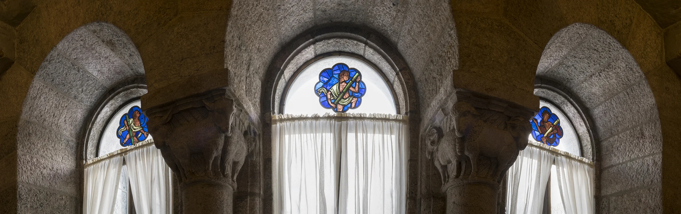 Figure 2: Three thirteenth-century stained glass panels from an abbey in northeastern France, in the collection of Glencairn Museum (ca. 1215-1220, 03.SG.204-206), depict the dead rising from their tombs at the Last Judgment. The Last Judgment was a common subject in rose windows and portals of churches and cathedrals. These panels are now installed in clear-glass windows on the third floor of Glencairn. 
