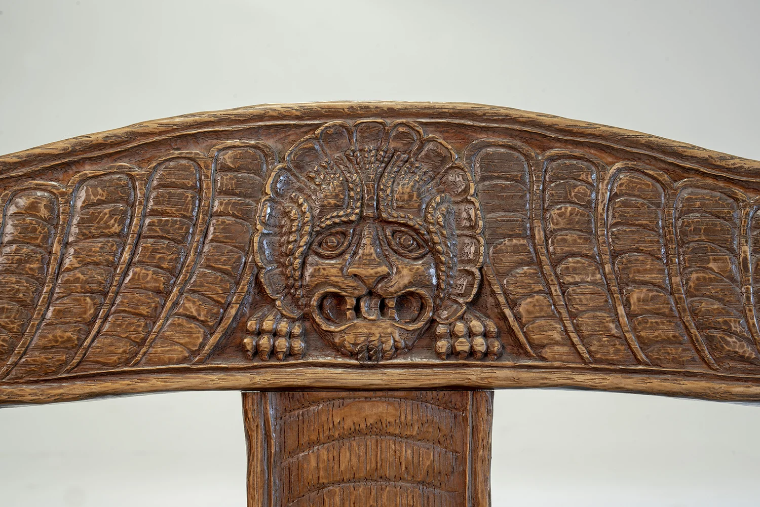 Figure 19: Bryn Athyn Cathedral Tyldal-style chair depicting a lion's head on the crest rail. 