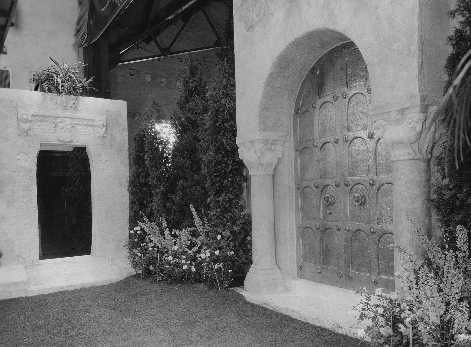 Figure 13: The left side of the Assembly Hall stage displayed a large plaster model of a doorway design concept for Glencairn's chapel.