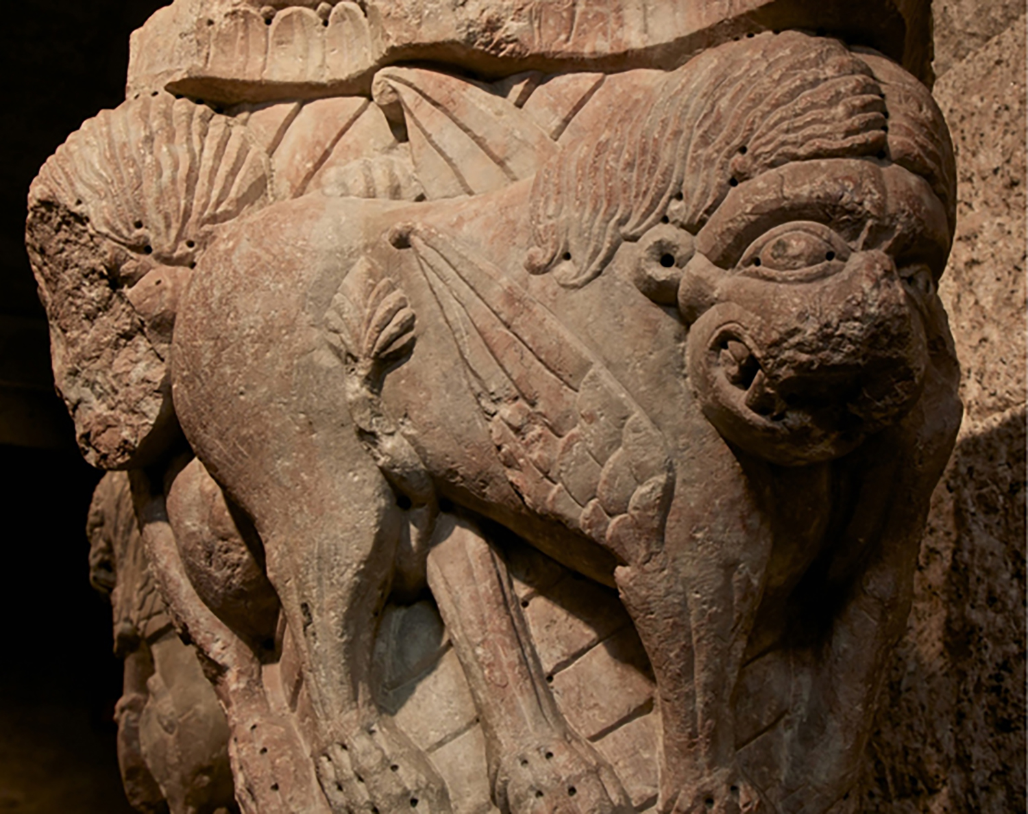 Figure 3: A capital carved from marble depicting confronted, winged lions from the 12th-century Benedictine monastery of Saint-Michel-de-Cuxa in France. Glencairn Museum 09.SP.168.