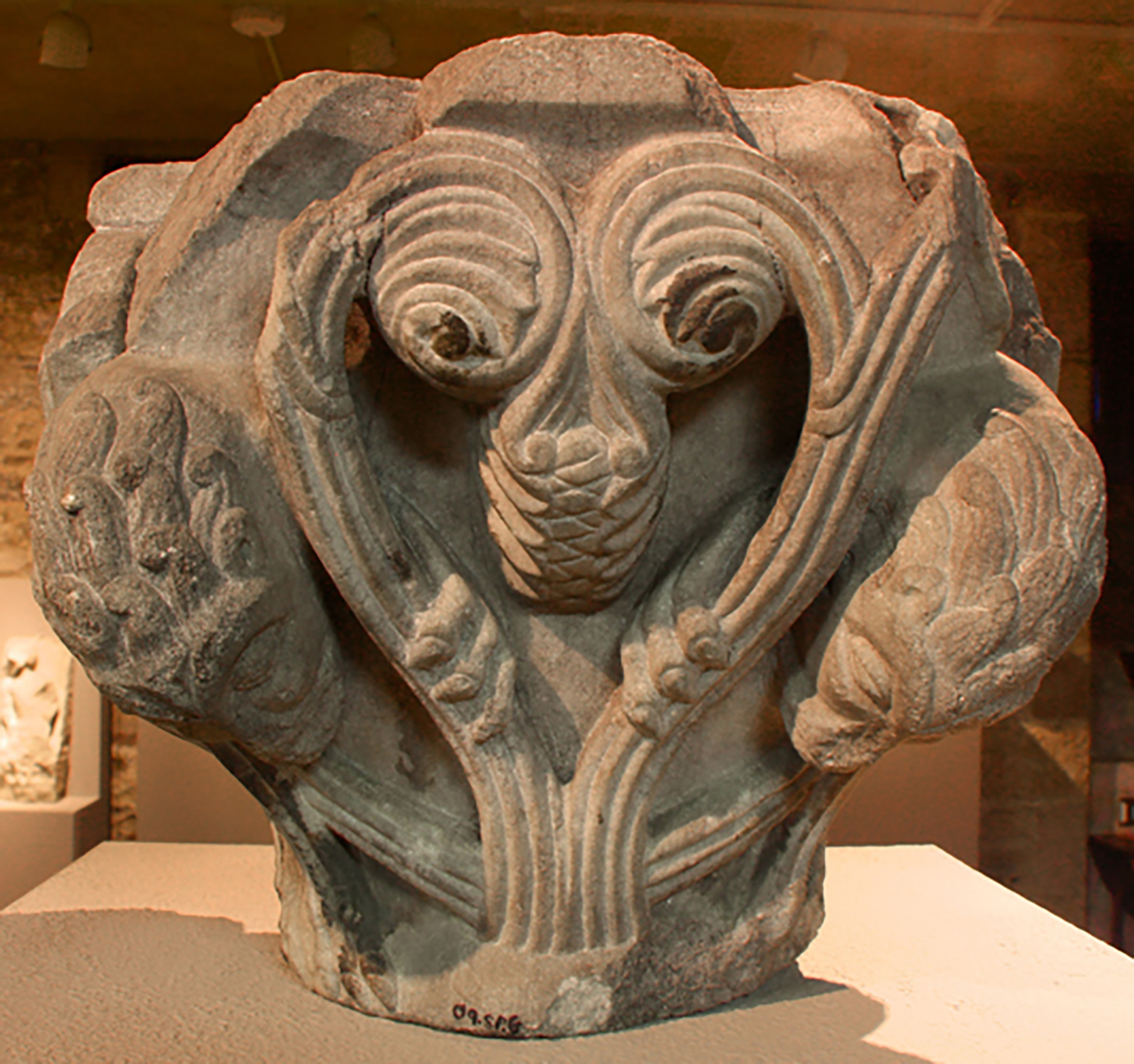 Figure 5: This 12th-century capital from Toulouse, France, carved from marble, depicts lions caught in thick vines. Glencairn Museum 09.SP.6.