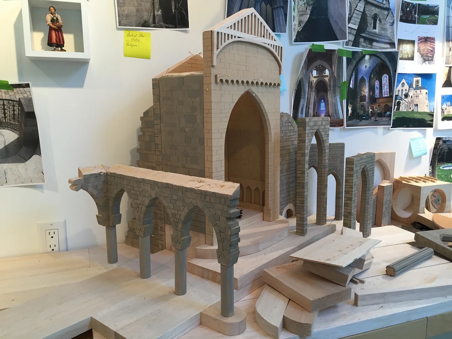 Figure 4: The Glencairn Nativity under construction. Columns and capitals from Glencairn’s Cloister can be seen on the left.