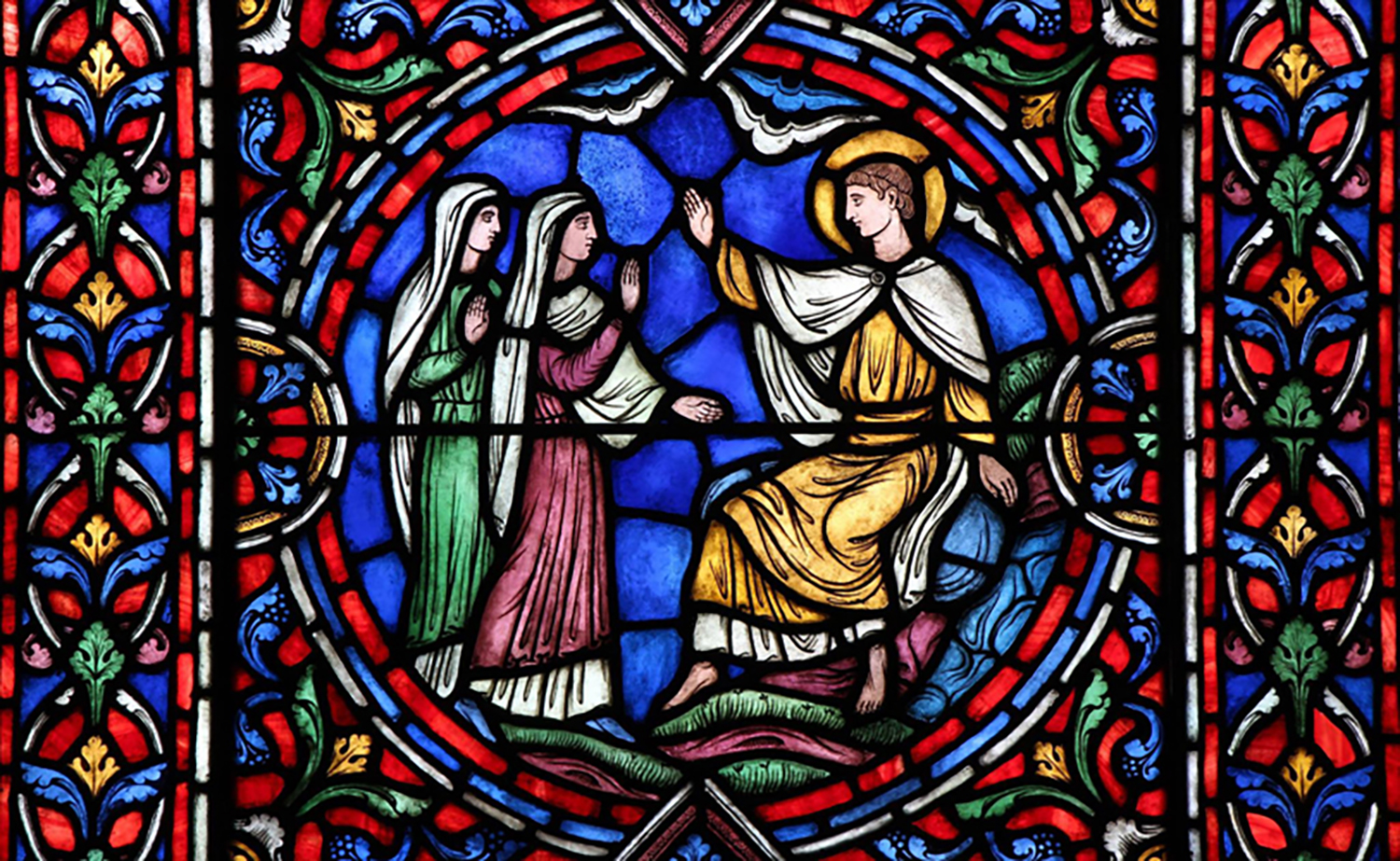 Figure 4: Glencairn’s chapel includes a stained glass window with three scenes from the Easter story, designed by Winfred Hyatt. The bottom panel depicts an angel sitting on a stone beside the open door of the tomb where the body of Jesus had been laid.