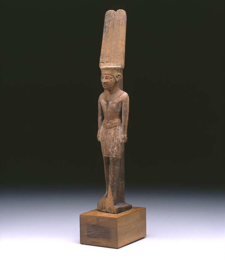 Figure 2: A wooden statue of the god Amun, Third Intermediate Period (1075-656 BCE). Penn Museum E14325.