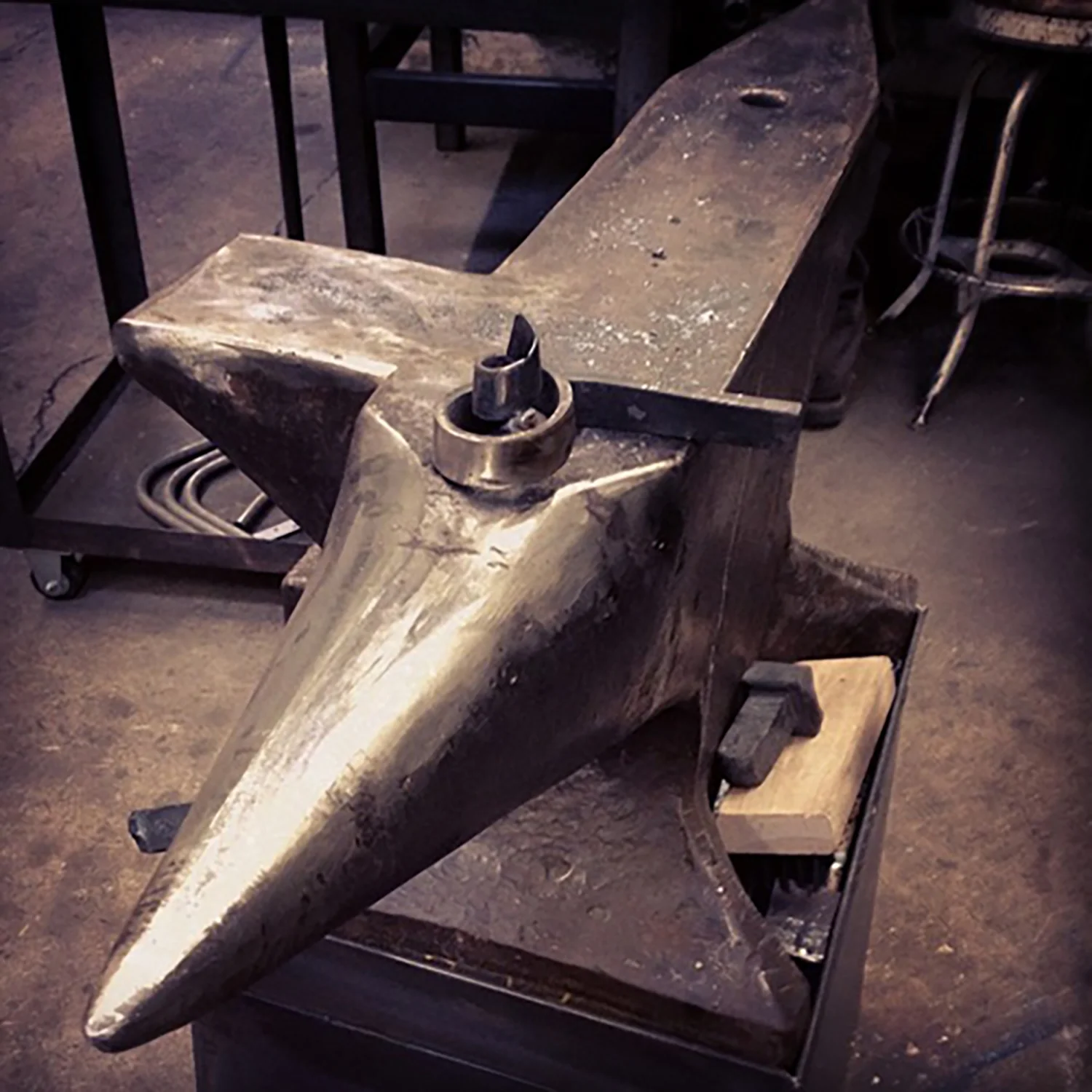 Figure 2: An anvil at Warren Holzman’s Iron Studio with a piece of metalwork. Photograph by Warren Holzman.