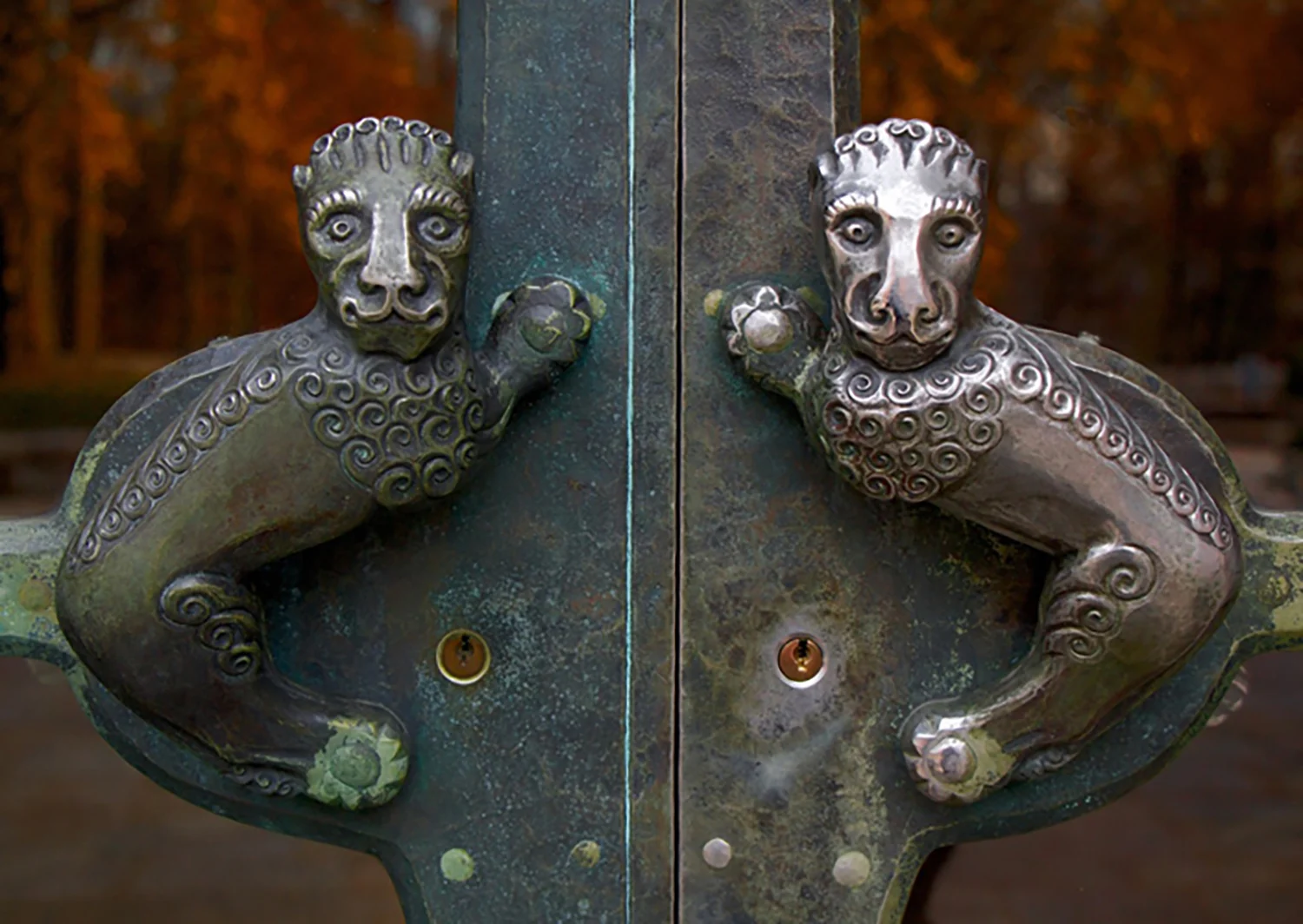 Figure 9: The door handles for the everyday entrance to Glencairn are lionesque-style creatures made from Monel. The right-hand one has a different patination because it is the side that opens and is therefore touched more frequently.