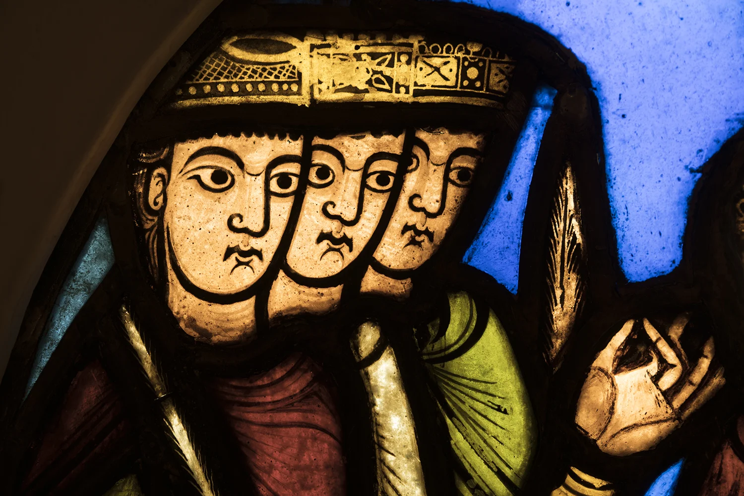 Figure 10: Detail of Figure 9 showing the three unrestored heads on the left side of the roundel (03.SG.111).