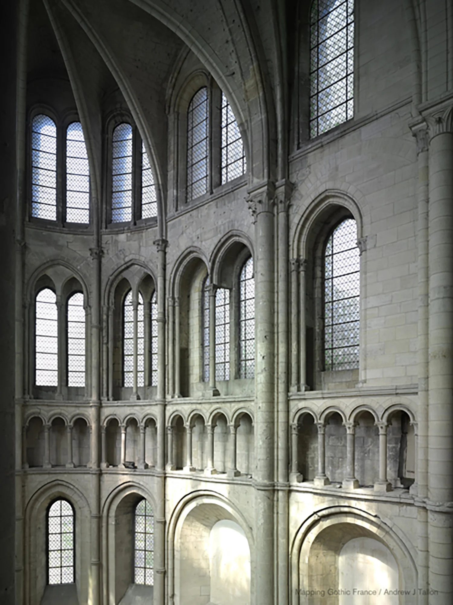 Figure 3: Noyon, Cathedral of Notre-Dame: view of the north transept. The rounded termination of the transept and inversion of the conventional levels of triforium and tribune are hallmarks of this age of experimentation.