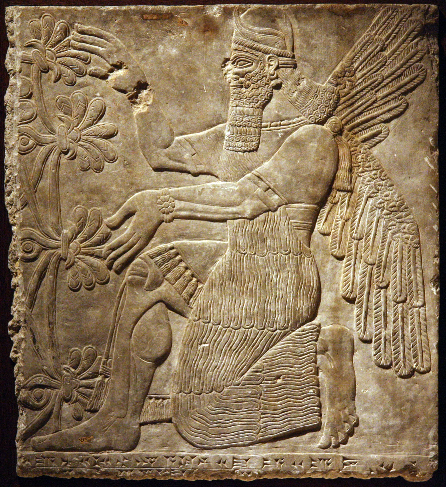Figure 1: Kneeling genie (09.SP.1549).