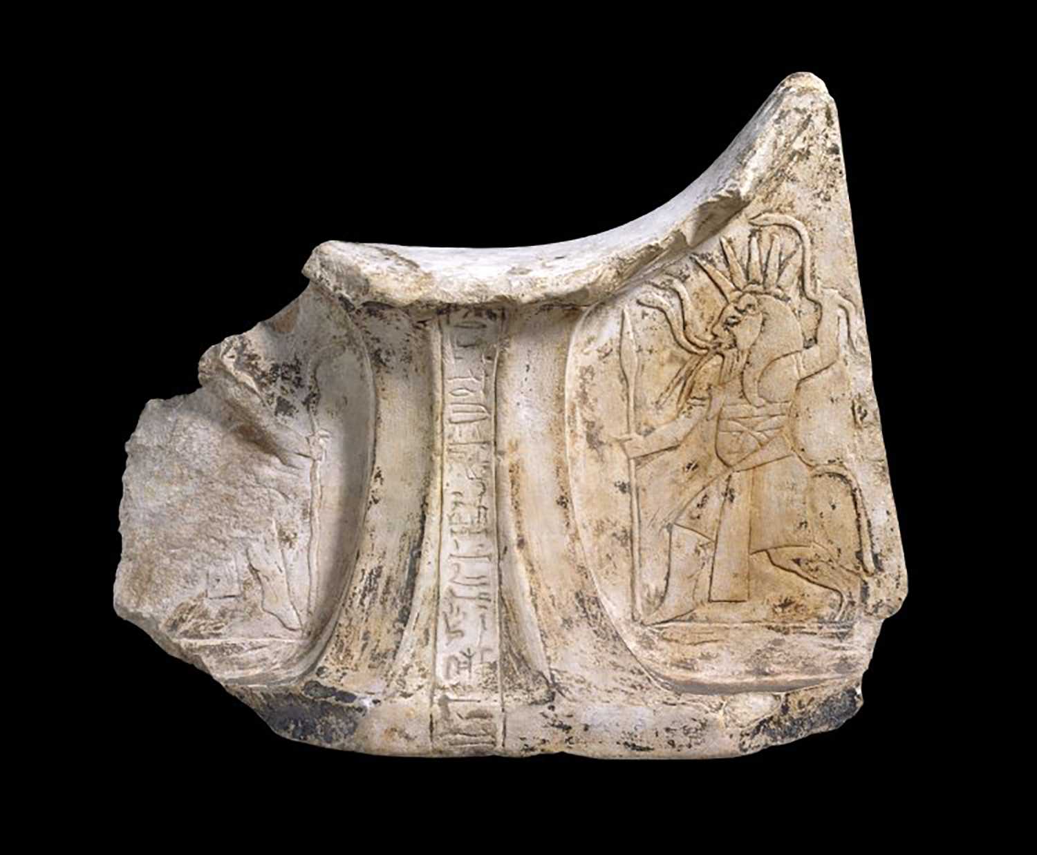 Figure 13: Headrests were often decorated with images of protective deities like Bes and Taweret. This limestone headrest from the British Museum (EA63783) bears images of the god Bes. The hieroglyphic inscription running down the center identifies the owner of the headrest, a man named Qeniherkhepeshef who lived in the village of Deir el Medina during Egypt’s Nineteenth Dynasty (ca. 1200 BCE). Image courtesy of The British Museum.