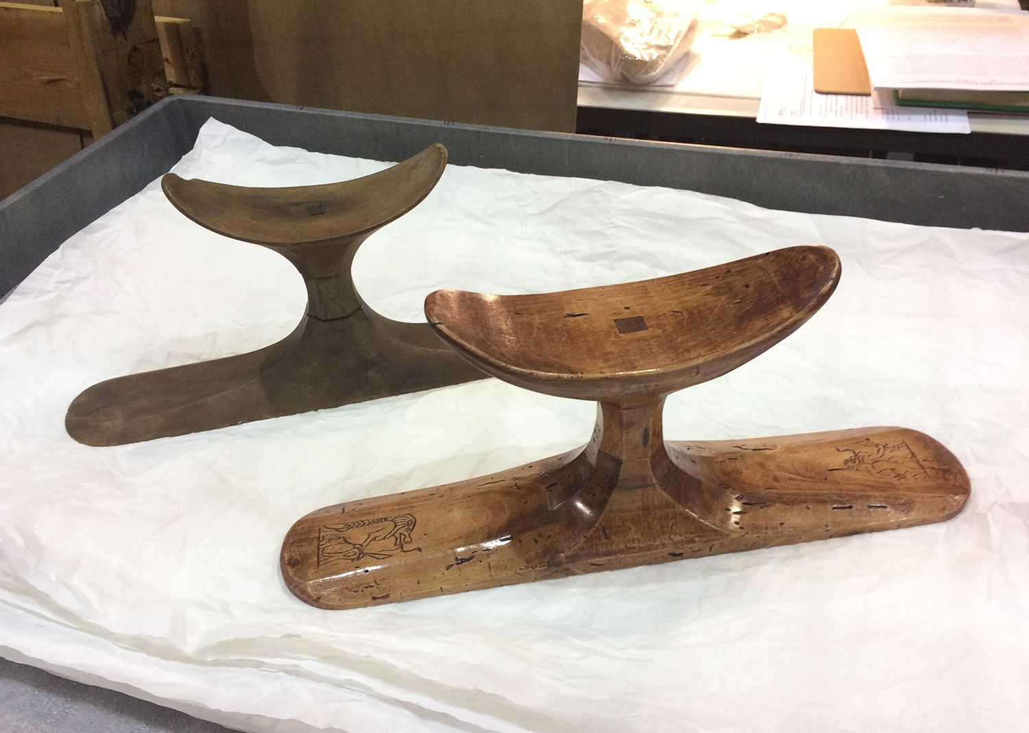 Figure 20: The finished replica headrest (in front) beside the original (UPMAA 29-86-400a, b).