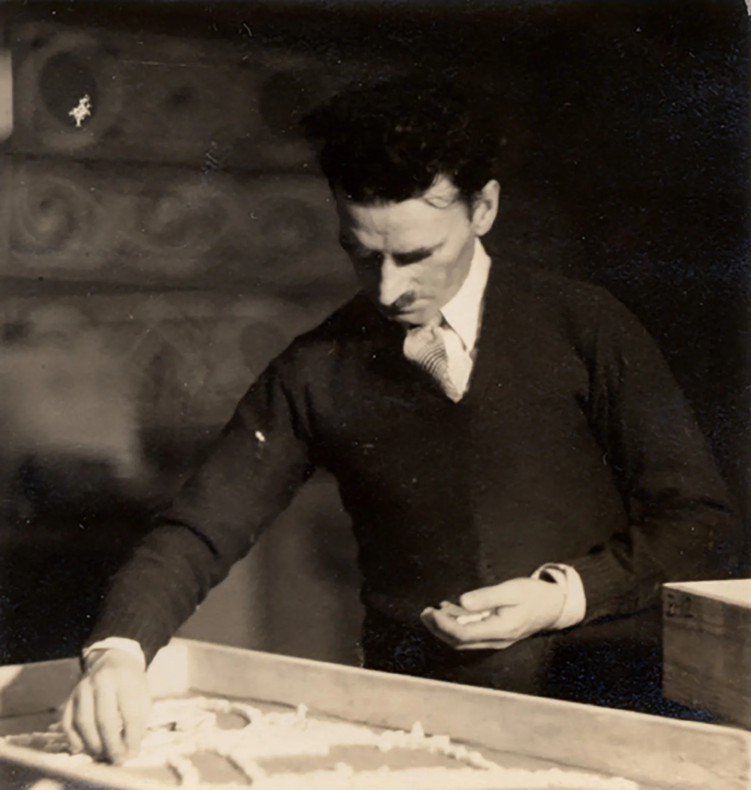 Figure 4: Albert Cullen setting tesserae for a mosaic design.