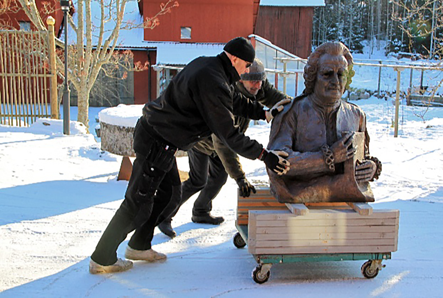 Figure 5: The bronze bust being loaded onto a truck for shipment to the United States.