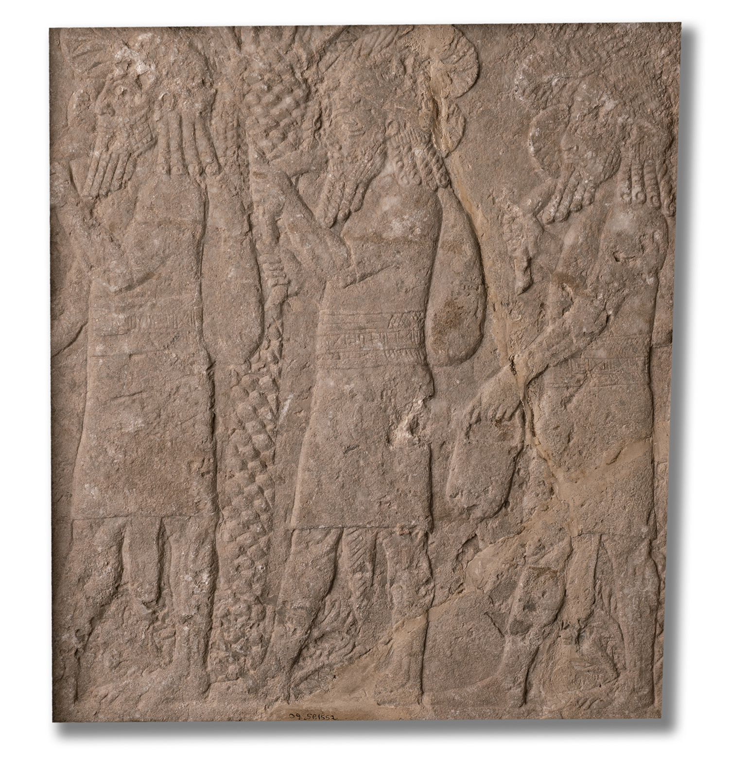 Figure 5: Gypseous limestone relief of Babylonian captives, from the courtyard of the North Palace of Ashurbanipal. Neo-Assyrian, seventh century BCE. In Glencairn’s Ancient Near East gallery (09.SP.1552).