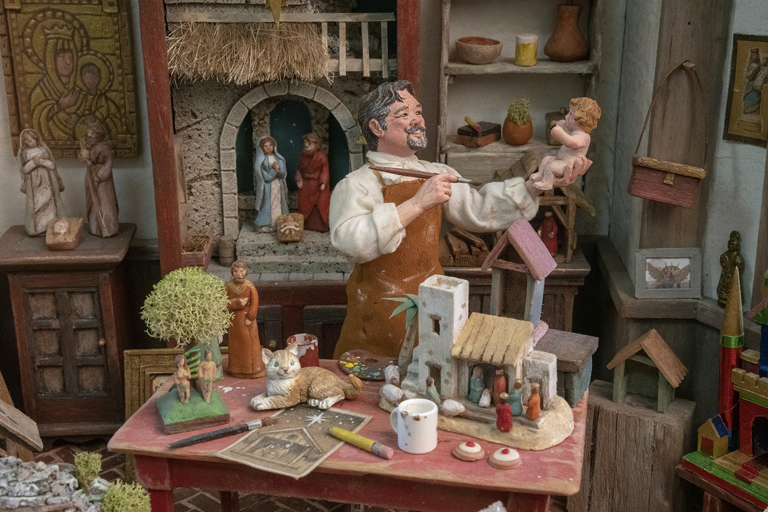 Figure 7: The Nativity artist featured in this scene, made by Karen Loccisano, bears a striking resemblance to her husband, R. Michael Palan.