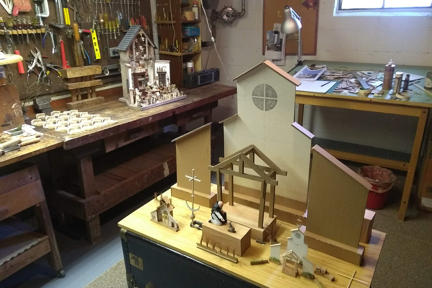 Figure 4: R. Michael Palan's basement workshop with several projects underway.