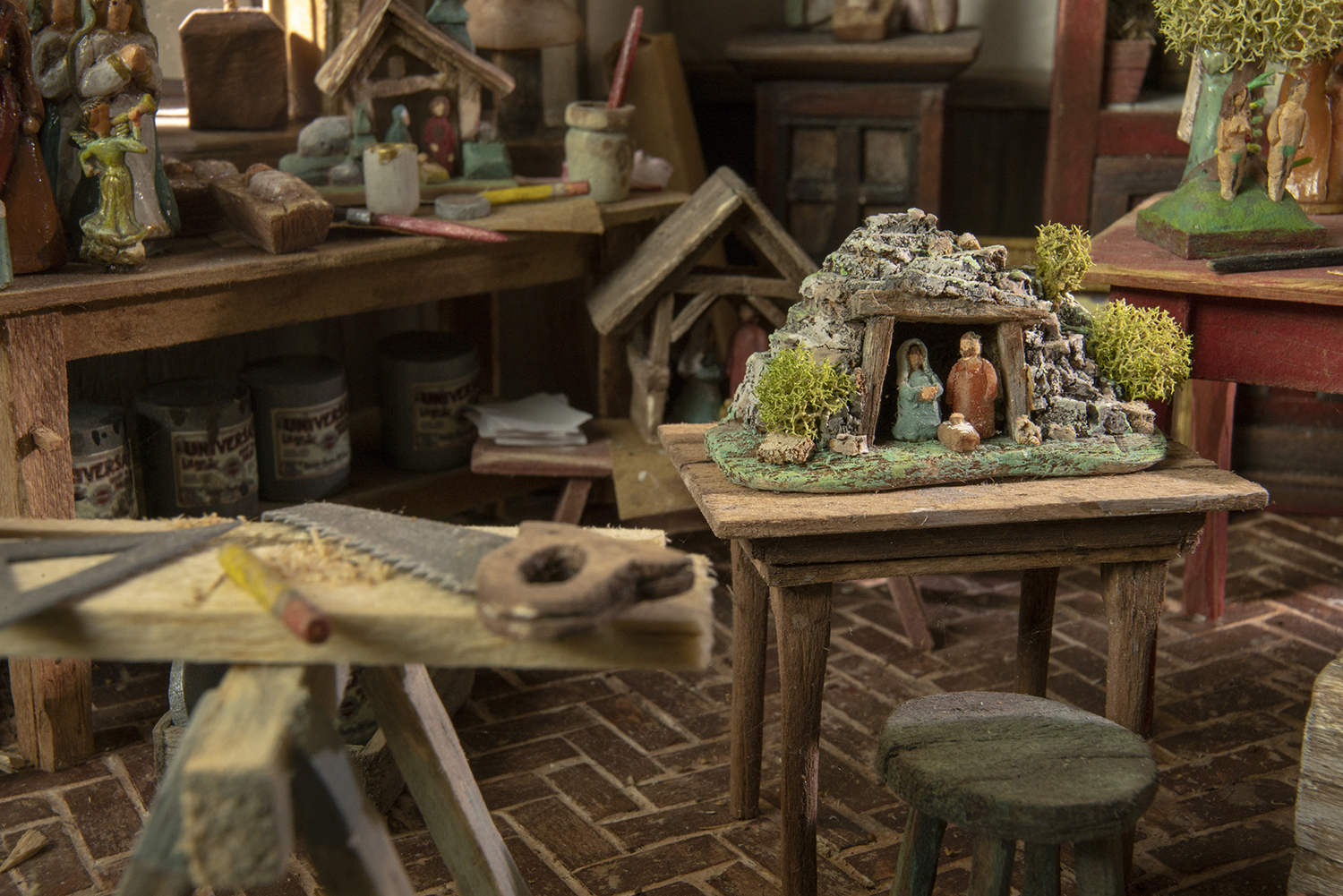 Figure 8: On the table is a scene representing the Grotto of the Nativity, a cave where some believe Jesus was born.