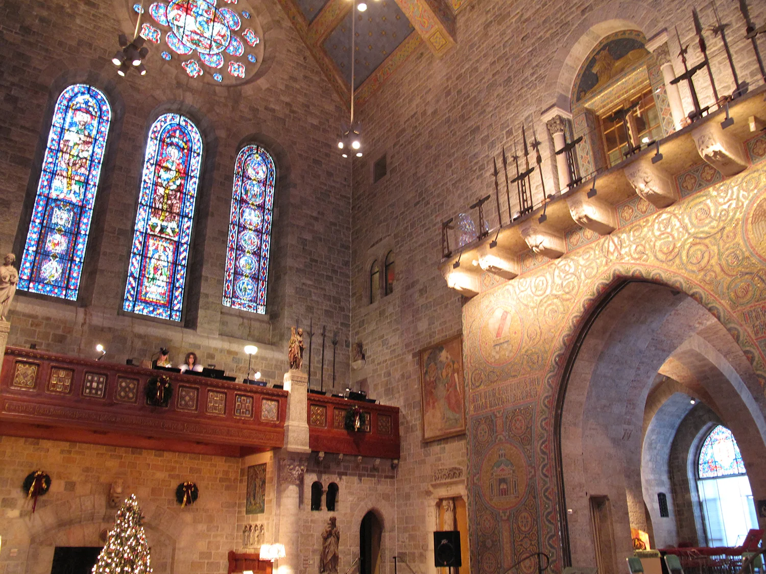 Figure 3: Medieval stained-glass window installation and mosaic arch, Great Hall, Glencairn Museum, Bryn Athyn, Pennsylvania. Photo: Jennifer Borland.