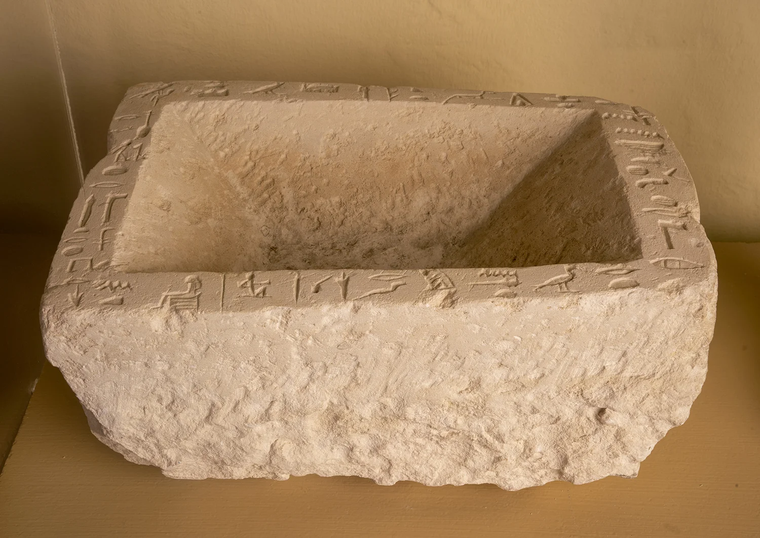 Figure 24: Limestone offering basin of Per-senet from her tomb at Giza, in Glencairn’s Egyptian Gallery. This basin is on loan from the University of Pennsylvania Museum of Archaeology and Anthropology, accession number E13526.