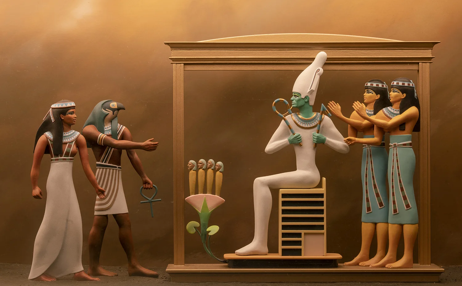 Figure 29: In this scene from a diorama on exhibit in the Egyptian Gallery at Glencairn, the deceased, a woman named Isty, is shown being ushered in before Osiris after passing successfully into the afterlife. This diorama is based on a Book of the Dead funerary papyrus now in the collection of the Field Museum in Chicago.