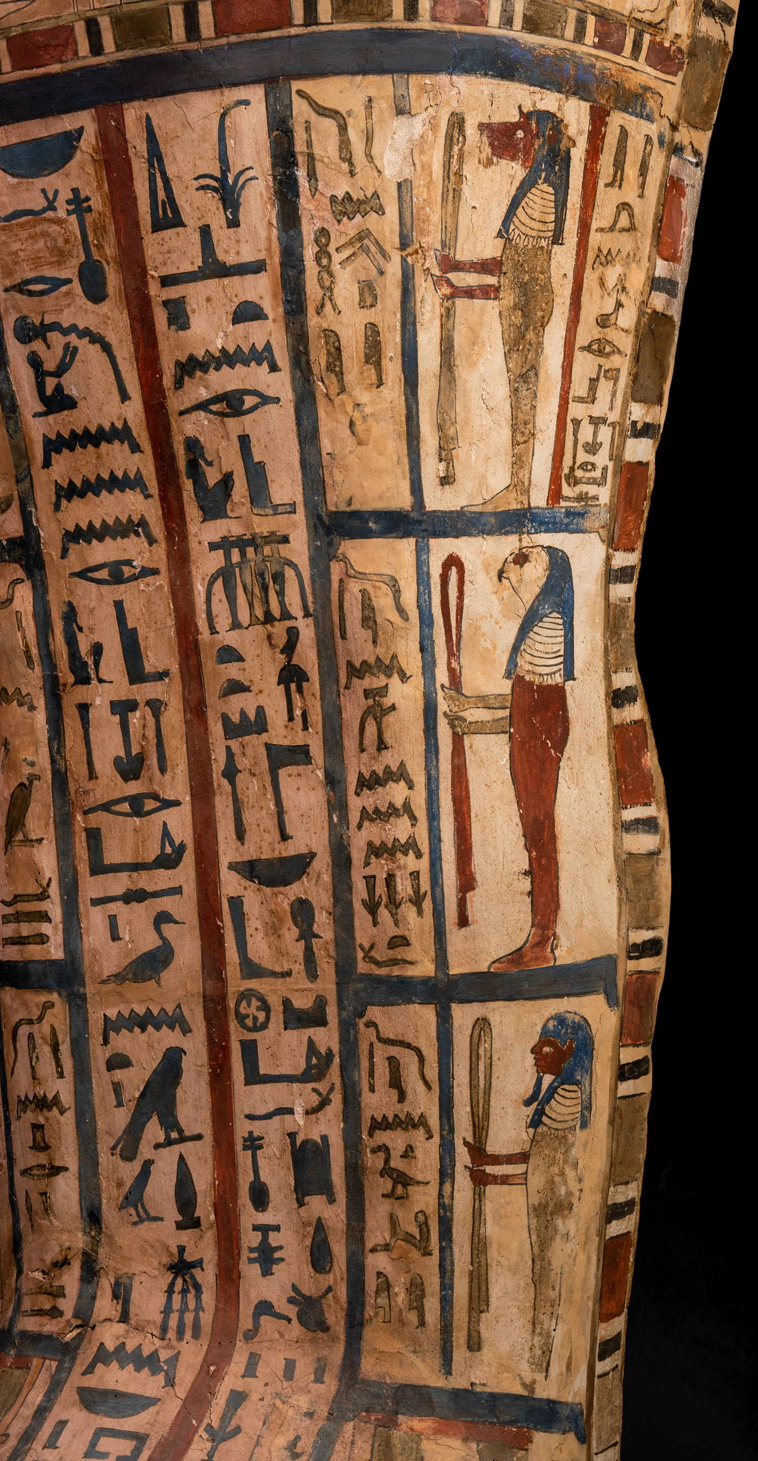 Figure 17: Funerary deities appearing top to bottom are baboon-headed Hapy, falcon-headed Qebehsenuef, and a human-headed deity.
