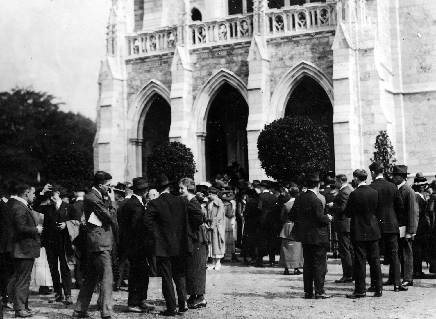 Figure 10: People mingling outside the west door of the Cathedral on October 5, 1919.